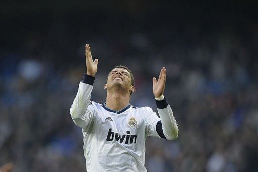 Real Madrid's Cristiano Ronaldo reacts at the Santiago Bernabeu stadium in Madrid on January 6, 2013